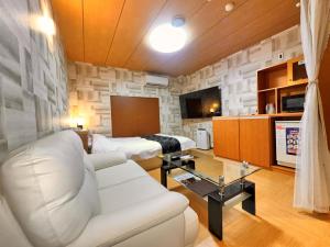 TV a/nebo společenská místnost v ubytování HOTEL Fiore Nakagawa -Adult Only- LOVE HOTEL