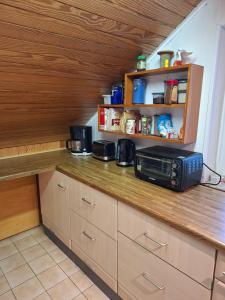 Η κουζίνα ή μικρή κουζίνα στο Casa Carmen - gemütlich, wohlfühlen +5 φωτογραφίες