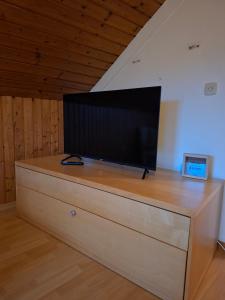 Μια τηλεόραση ή/και κέντρο ψυχαγωγίας στο Casa Carmen - gemütlich, wohlfühlen