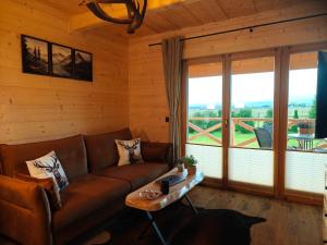 Posezení v ubytování Domek z Sercem + 32 fotografií