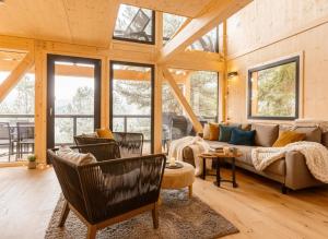 Posezení v ubytování Naturchalets Turracher Höhe by ALPS RESORTS