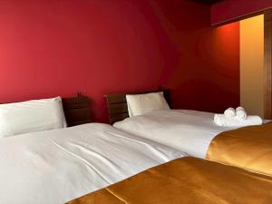 Postel nebo postele na pokoji v ubytování 東山むらさき murasaki + 113 fotografií