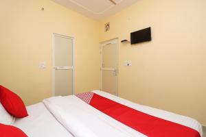 En eller flere senge i et værelse på Hotel O Dream