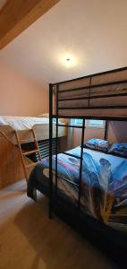 En eller flere senge i et værelse på Appartement mer