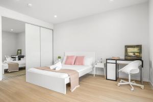 Ένα ή περισσότερα κρεβάτια σε δωμάτιο στο Tranquil Studio in Schofields