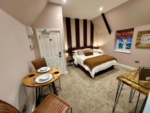 En eller flere senge i et værelse på The Station at Shustoke