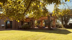 a house with a gazebo in a yard at Pool Villa With Animals Near Sutri in Sutri