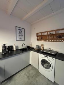 Køkken eller tekøkken på Dom Przy Lesie Zielonowo