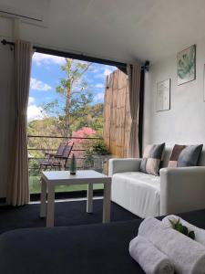 Et opholdsområde på ม่านป่ามองเขาเฮ้าส์