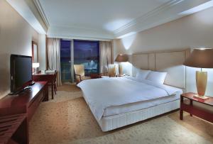Gulta vai gultas numurā naktsmītnē Hotel Hyundai by Lahan Mokpo