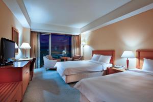 Gulta vai gultas numurā naktsmītnē Hotel Hyundai by Lahan Mokpo