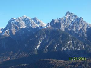 a view of a mountain range with a blue sky at Apartment cajos-ftan by Interhome in Ftan