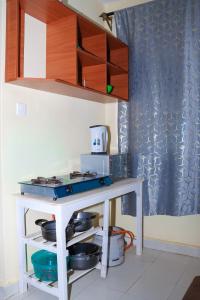 Kuchyň nebo kuchyňský kout v ubytování Nivana studioBnB