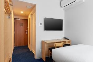 TV a/nebo společenská místnost v ubytování Sotetsu Fresa Inn Yodoyabashi + 45 fotografií