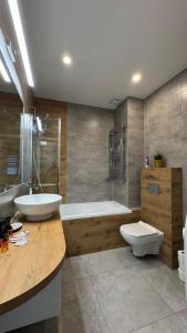 Phòng tắm tại Tabago Studio 42 Oława Iwaszkiewicza