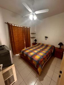 En eller flere senge i et værelse på Departamento peckyto 6