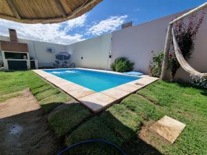 Bazén v ubytování El jacaranda Alojamiento Diario nebo v jeho okolí