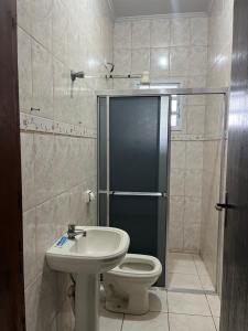 Koupelna v ubytování Casa Boqueirão excelente localização