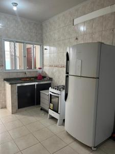 Kuchyň nebo kuchyňský kout v ubytování Casa Boqueirão excelente localização