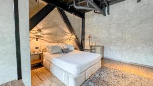 En eller flere senge i et værelse på Lleras Vibex Party