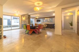 Posezení v ubytování chambre avec salle de bain privative