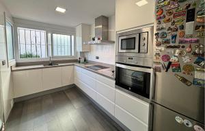 Køkken eller tekøkken på Casa Benalgabon