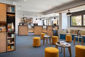 En restaurant eller et andet spisested på Résidence Pierre & Vacances Capella + 23 billeder