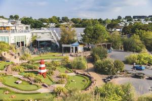 an aerial view of a park with a miniature lighthouse at The Pilot s Rest sleeps 6 in Exmouth