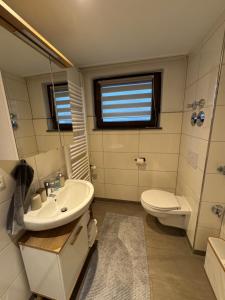 Phòng tắm tại Ferienwohnung Krautfassblick