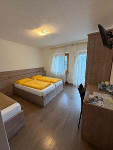 Postel nebo postele na pokoji v ubytování Rifugio Capanna Bill