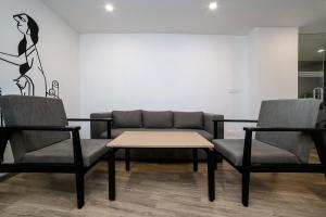 Et opholdsområde på Hotel O Elite