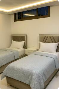 Ένα ή περισσότερα κρεβάτια σε δωμάτιο στο Dreamy ocean getaway! Renovated bungalow +33 φωτογραφίες