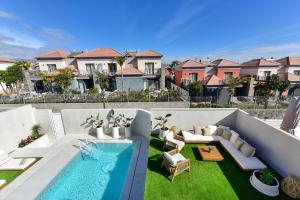 Swimmingpoolen hos eller tæt på Meloneras Hills 16 With Pool by VillaGranCanaria