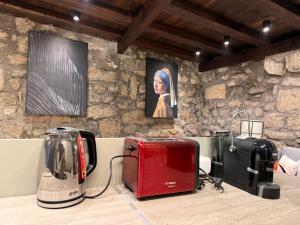 Příslušenství pro přípravu čaje a kávy v ubytování Villa Petra