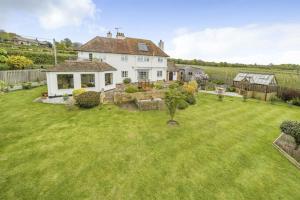 an aerial view of a house with a yard at Merryweather in Canterbury