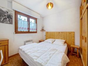 En eller flere senge i et værelse på Jonquilles JQM2 SUNNY & VIEW 4 pers