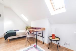 Giường trong phòng chung tại Le Sarrail - Hypercentre et 12 Couchages