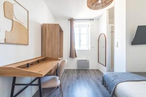 Giường trong phòng chung tại Le Sarrail - Hypercentre et 12 Couchages