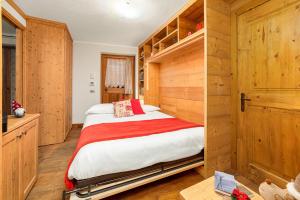 En eller flere senge i et værelse på Maison Carrel Elegant 7