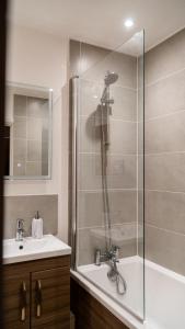 Et badeværelse på K Suites - Bridge Road AP19