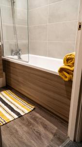 Et badeværelse på K Suites - Bridge Road AP19