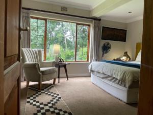 En eller flere senge i et værelse på The Ridgeback, 4 Bedroom Good Living, Bryanston + 31 billeder