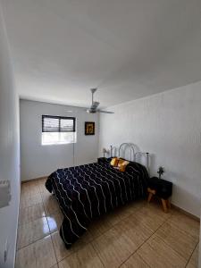 En eller flere senge i et værelse på La unión