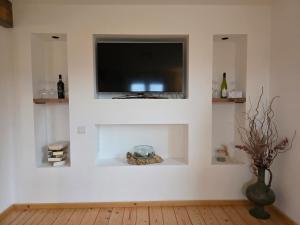 TV a/nebo společenská místnost v ubytování Ferienwohnung Auszeit