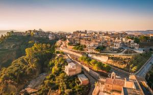 an aerial view of a town on a hill at Glory House in Mazzarino