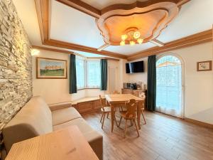 Et opholdsområde på B&B Family Accommodation Canazei SKI-IN SKI-OUT