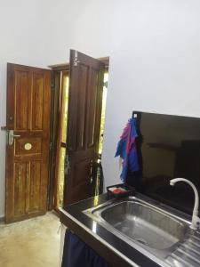a kitchen with a counter top and a sink at White Horizon 2 in Ahangama