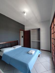 Postel nebo postele na pokoji v ubytování Pousada Emanuelli