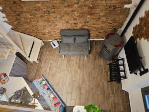an overhead view of a chair in a living room at Casa GiuBarElla in Vanzago