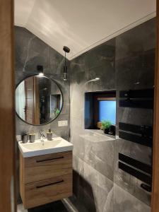 Phòng tắm tại Apartament Górska Przystań